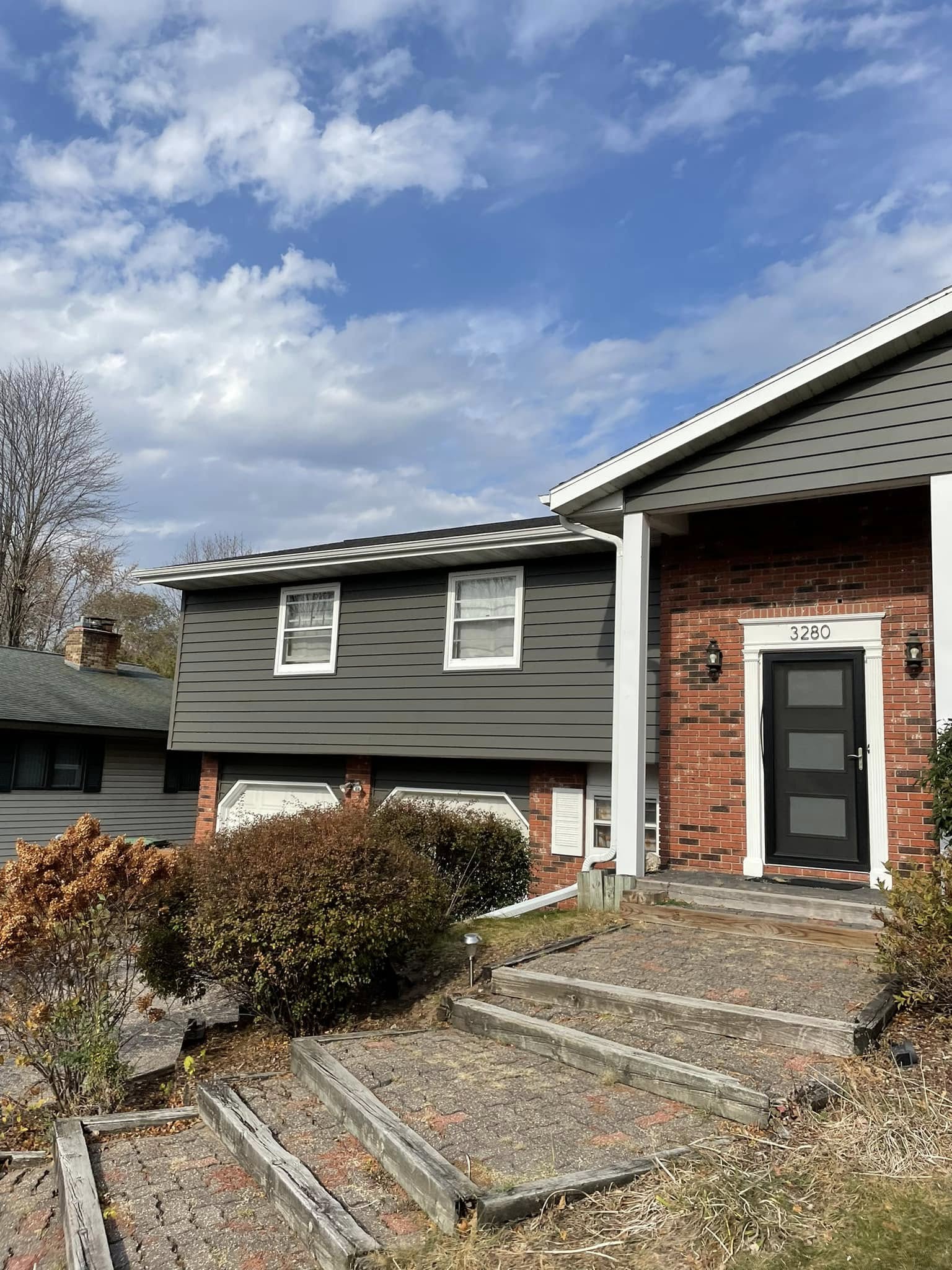 black home siding install