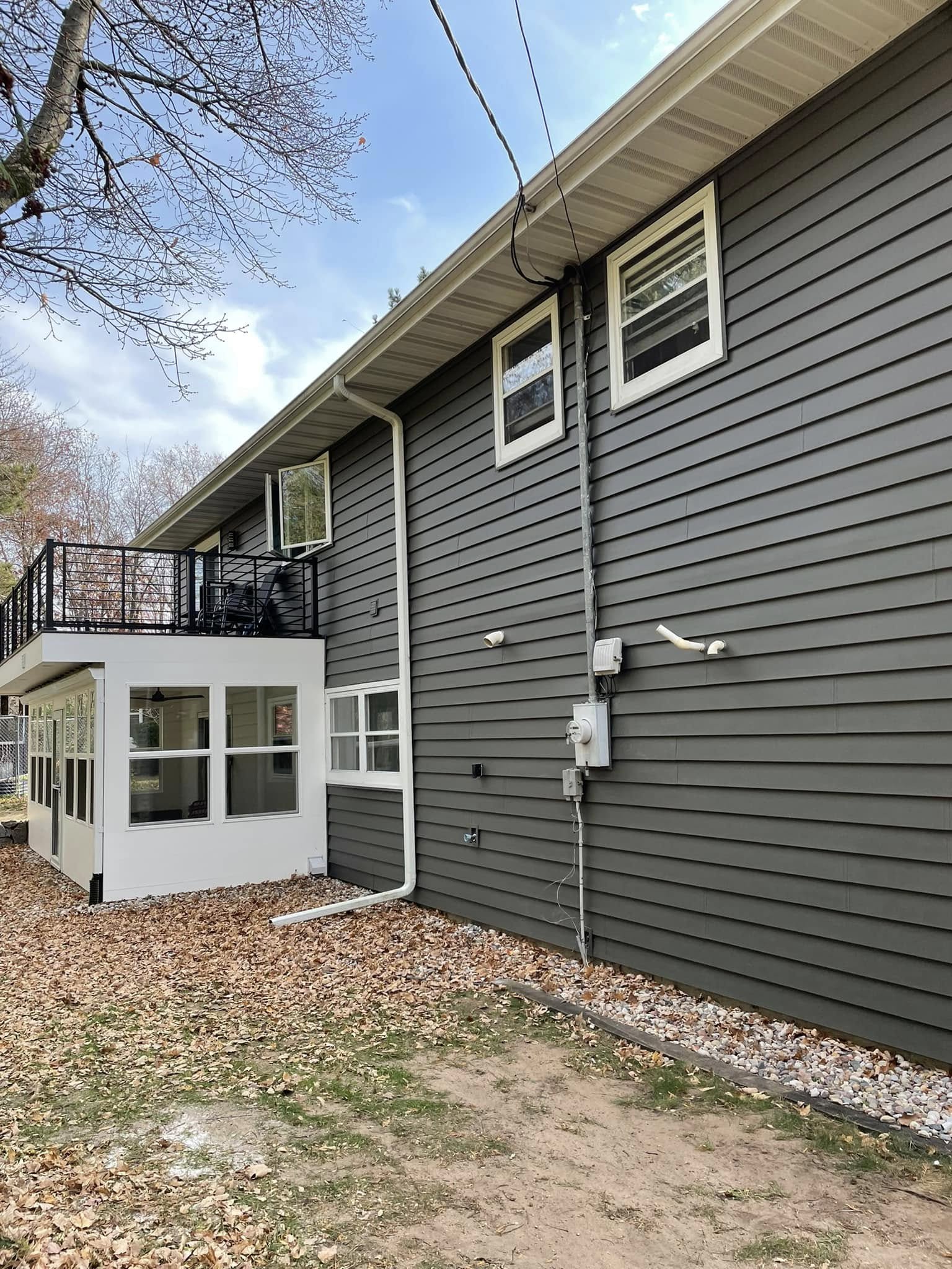 gray home siding for multi level house