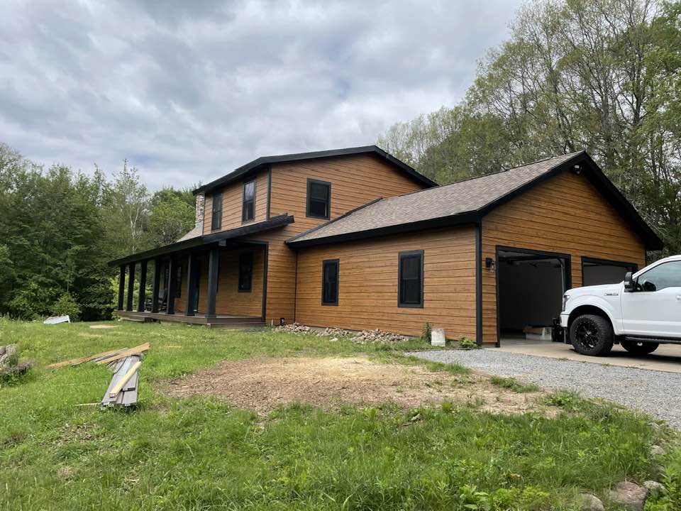new wooden shingles siding for entire house